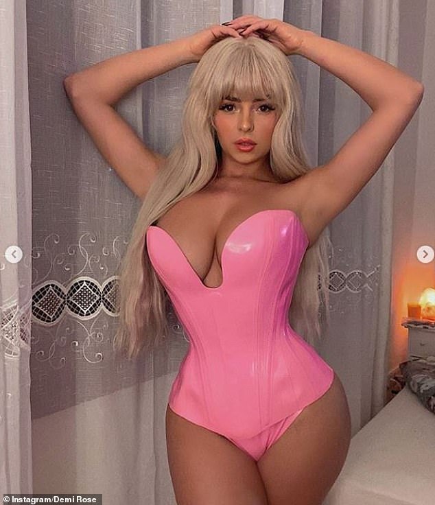 Living doll: Demi Rose set pulses racing as she transformed into a PVC Barbie for her sizzling Halloween look on Thursday