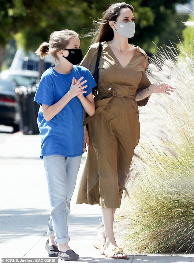 Out and about: Angelina Jolie and her 11-year-old daughter Vivienne were glimpsed out and about in Los Angeles this Friday