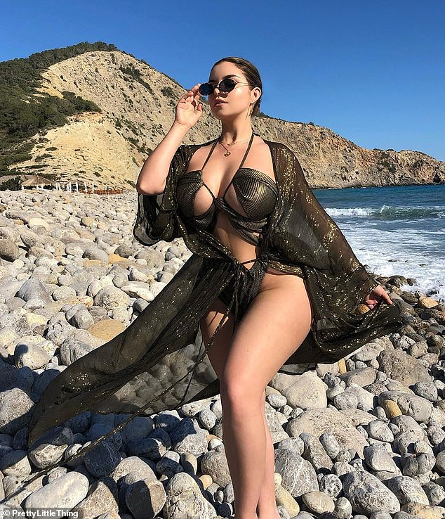 Beach babe: Demi Rose set pulses soaring as she showed off her killer curves and a glimpse of sideboob in a plunging metallic PrettyLittleThing ʙικιɴι on Tuesday