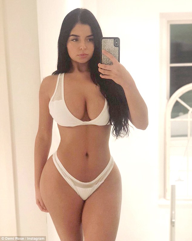 Sultry display: Demi Rose, 22, continued to thrill fans on Thursday as she flaunted her hourglᴀss curves and jaw-dropping ᴀssets in a skimpy white thong ʙικιɴι