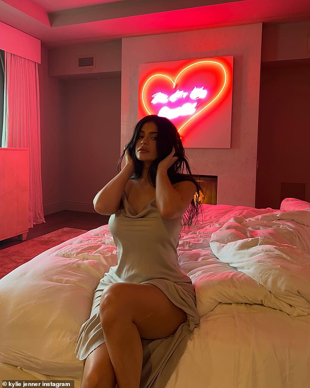 Kylie Jenner seductively pulls down her slip dress in snaps from bedroom  shoot | Express Digest