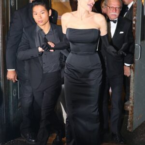 Angelina Jolie ignites the night in a chic black ensemble, defying the cold during a family dinner in NYC. Stunning as always!