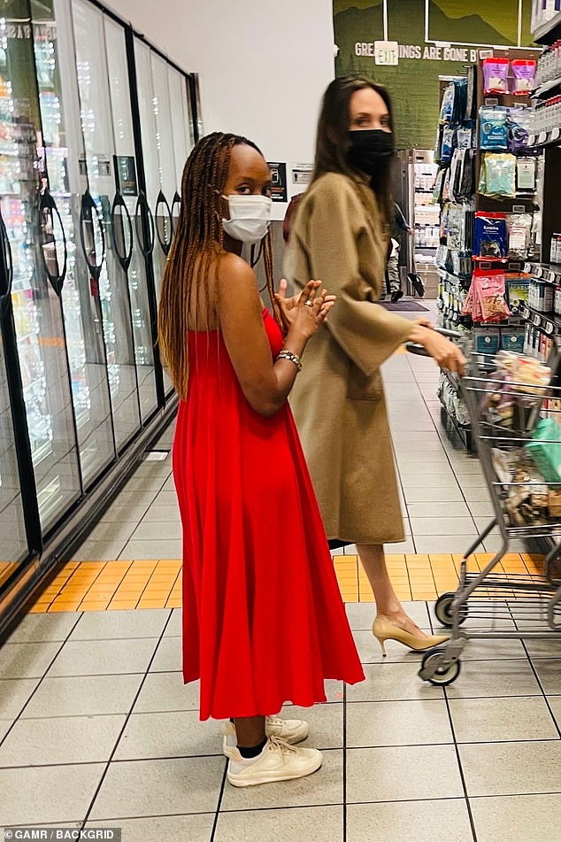 Fashion forward: Angelina Jolie, 46, steps out in a typically chic outfit as she goes grocery shopping with her daughter Zahara, 16, on Saturday