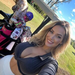 Paige Spiranac calls herself “a tease” as she models a low-cut top that’s primed to burst