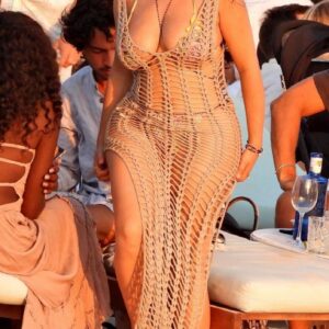 Demi Rose making waves in Ibiza with her stunning curves and dazzling style.