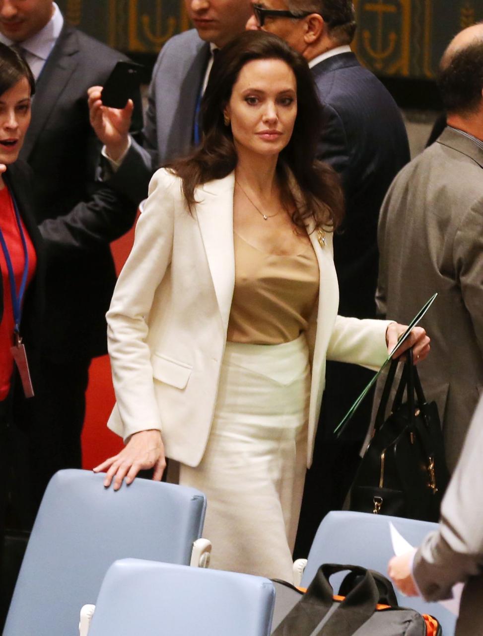 https://celebmafia.com/wp-content/uploads/2015/04/angelina-jolie-speaks-onstage-during-the-women-in-the-world-summit-held-in-new-york_2.jpg