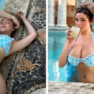 ﻿Demi Rose goes knickerless as she dons tiny blue swimsuit in sultry pool shoot