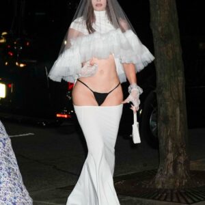 Julia Fox wears bizarre bridal-themed outfit with her G-string on show – as she attends posh Sotheby’s event alongside Vogue editor Anna Wintour Julia Fox wears bizarre bridal-themed outfit with her G-string on show – as she attends posh Sotheby’s event alongside Vogue editor Anna Wintour