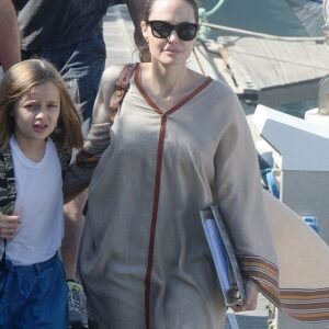 Angelina Jolie taking a break from filming to embark on an adventure with her twins Viviennne and Knox, cruising on a boat. Family time well spent!