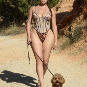 Embracing the simple pleasures of life, Demi Rose spreads warmth and joy on her leisurely stroll with her beloved puppy. Happiness in every step.