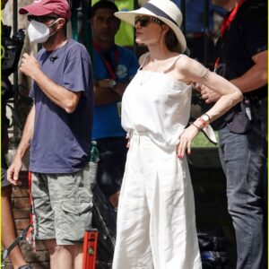 Angelina Jolie slays in stylish protective gear on the set of Without Blood filmed in Italy. Her iconic look is turning heads and we’re here for it!