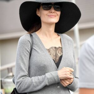 Embodying grace and style, Angelina Jolie effortlessly shines at the Rose Bowl Flea Market. Her presence exudes timeless elegance wherever she goes.