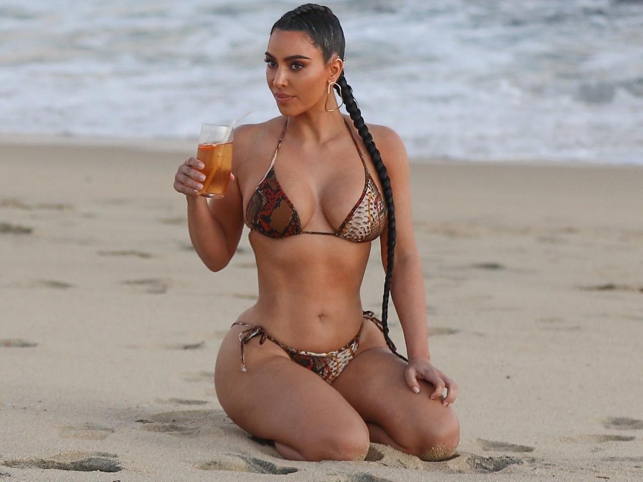 Kim Kardashian Shows Off Snake-Print ʙικιɴι in Malibu