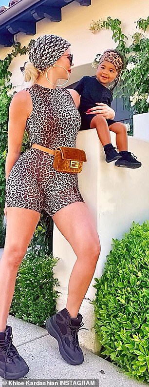 Khloe Kardashian and True are twins in leopard print as she shares cryptic message about liars | Daily Mail Online