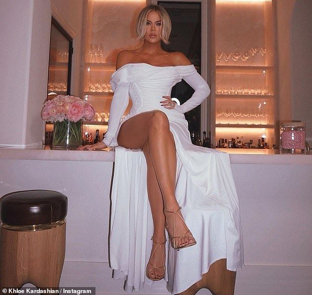 Khloé Kardashian is a vision in a white off-the-shoulder dress | Khloe  kardashian outfits, Street style dress, Khloe kardashian house