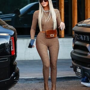 Khloe Kardashian looking fierce in her Fendi x SKIMS catsuit, flaunting her fabulous figure with confidence and style.