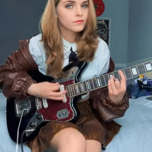 Emma Watson Rocks Out with Edgy Style, Electrifying on the Electric Guitar vs