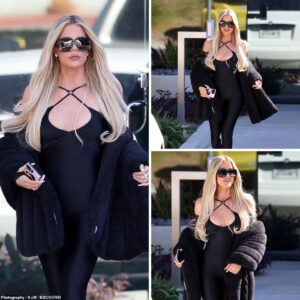 Bow down to the queen of chic! Khloe Kardashian stuns in a fierce black catsuit, serving major looks at the SKIMS pH๏τoshoot in Burbank.