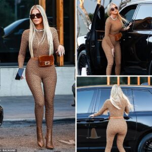 Khloe Kardashian slaying in her Fendi x SKIMS catsuit, exuding confidence and style. She’s a vision of fierce beauty!