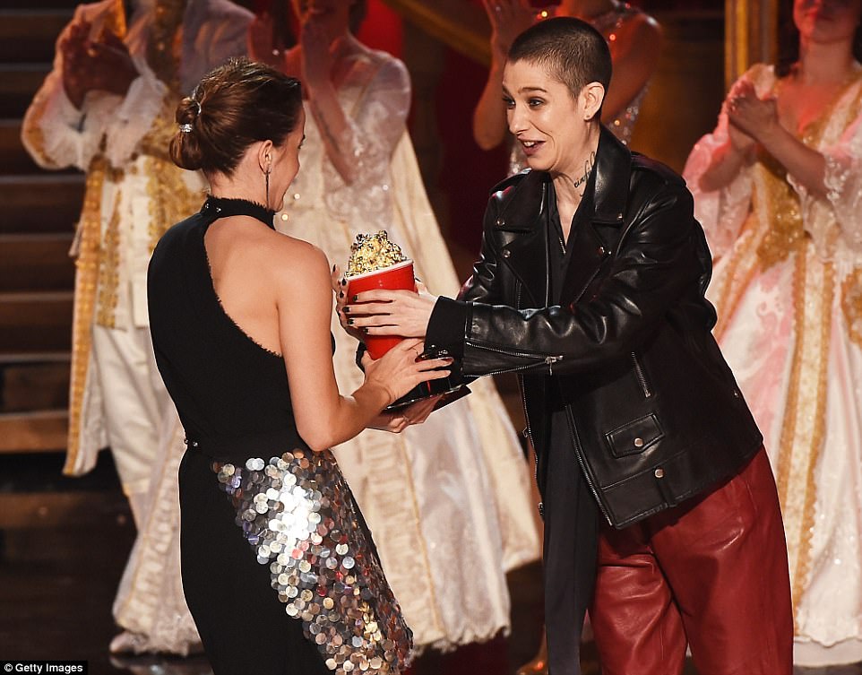 Meaningful moment: Watson received her Best Actor In a Movie Award for Beauty And The Beast from 'non-binary' actor Asia Kate Dillon, who stars on Showtimes Billions