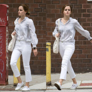 Strutting her stuff in those fabulous white pants, Emma’s got the street style game on lock! ✨ #FashionGoals