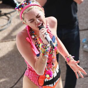 Mesmerizing sunrise vibes as Miley Cyrus lights up the iconic Sydney Opera House with her energetic performance on morning TV show!