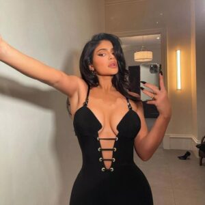 Kylie Jenner proves she’s the queen of style in a sleek black jumpsuit, shutting down any speculation with her authentic confidence and elegance.