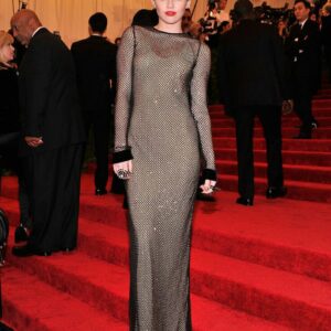 Throwback to Miley Cyrus rocking a daring mesh Marc Jacobs dress at the Met Gala red carpet in 2013. Who could forget that iconic glam moment