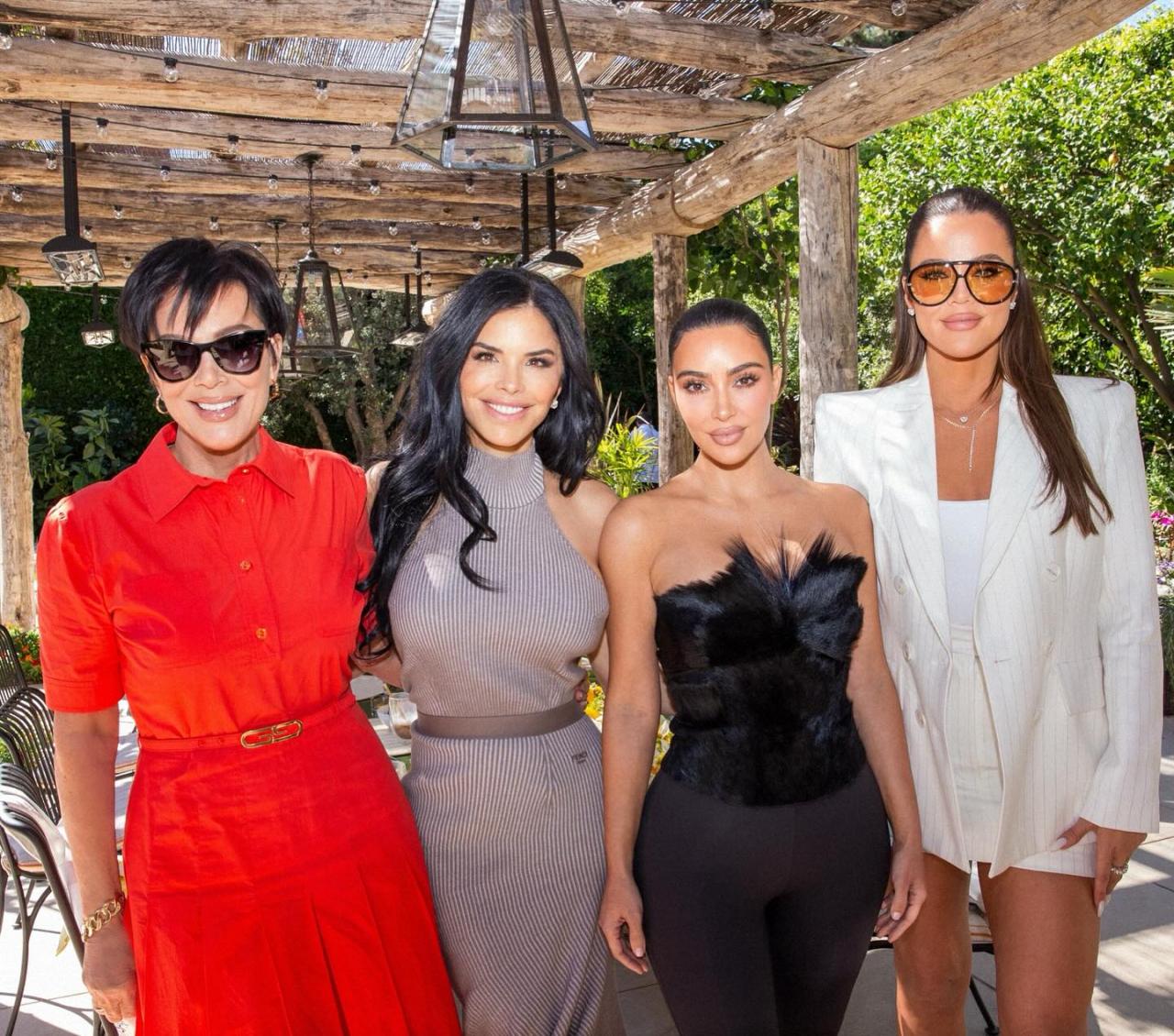 Kris Jenner, Lauren Sanchez, Kim Kardashian and KHloe Kardashian posing together 