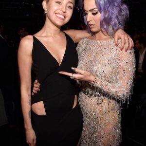 Katy Perry’s priceless expression says it all as she reacts to Miley Cyrus’s bold fashion statement backstage at the Grammys.